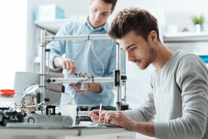 3D printing engineer working in a lab